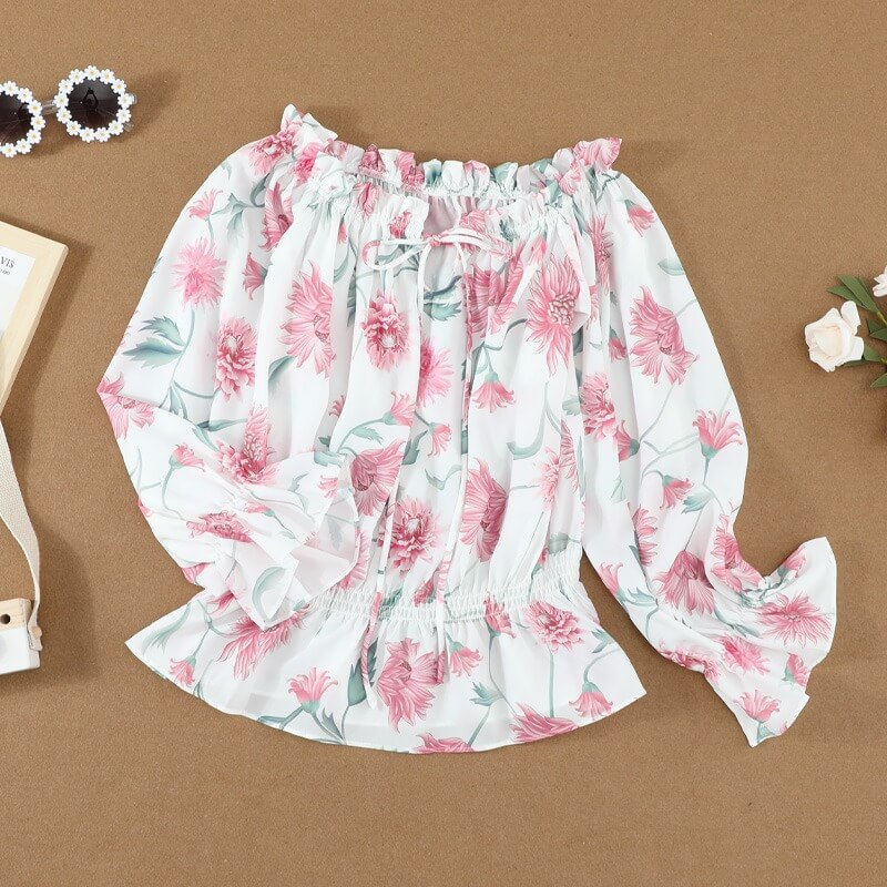 Blouse met ruches aan de mouwen en bloemen