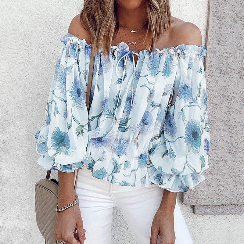 Blouse met ruches aan de mouwen en bloemen