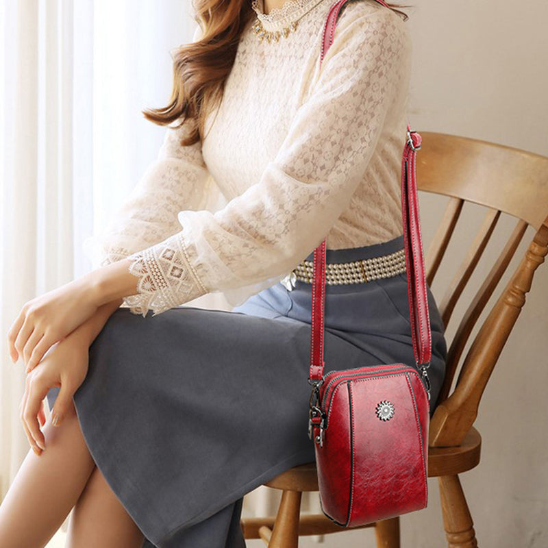 Mini-crossbodytas van zacht leer