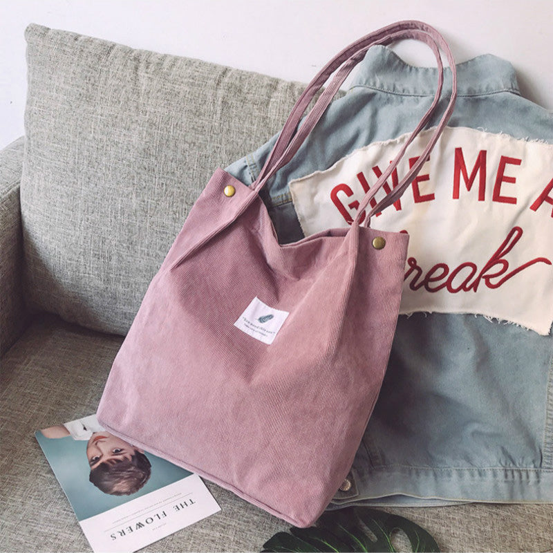 Corduroy draagtas met letterpatch