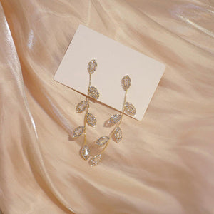 Oorbellen met glanzend zirkoonblad