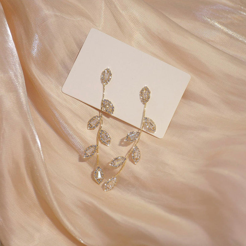 Oorbellen met glanzend zirkoonblad