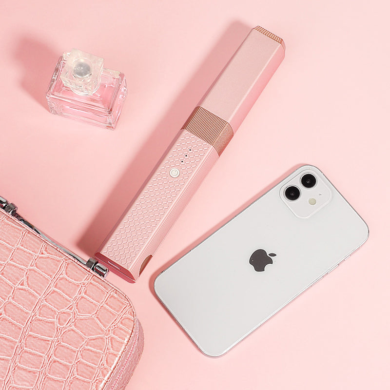 Draagbare krultang met draadloos opladen via USB