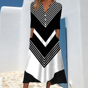 Zwart-witte midi-jurk met matrozen streep en zijzakken