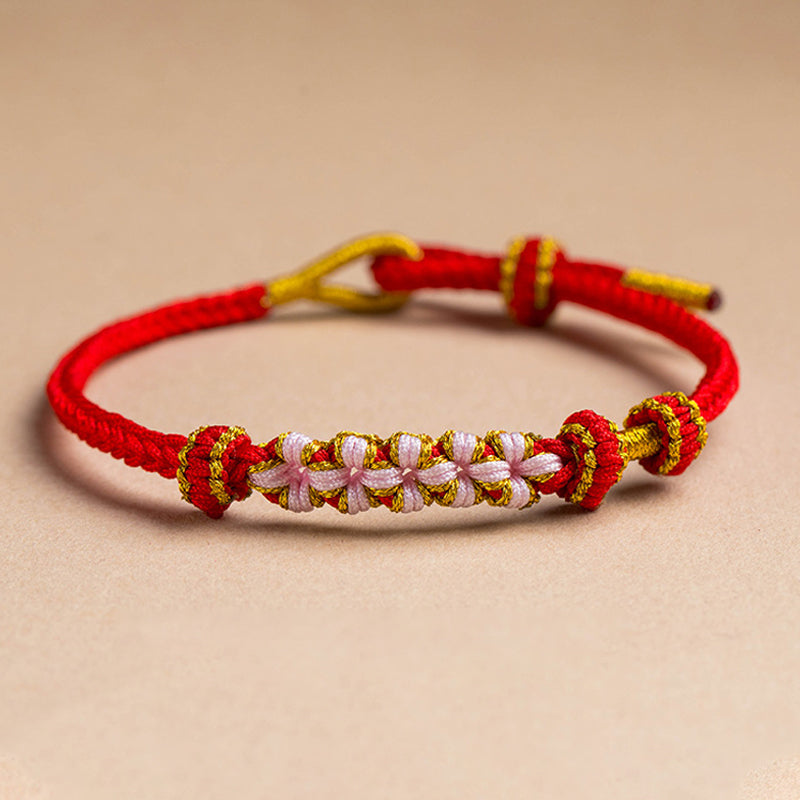 Perzik bloesem knoop armband