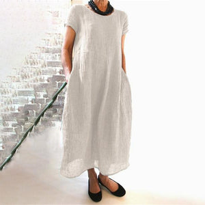 Losse katoenen jurk met ronde hals in effen kleur