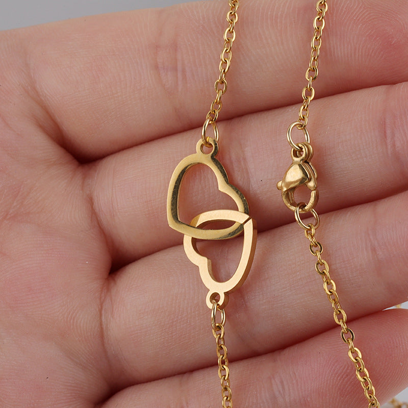 Ketting met twee harten en een roterende rozengeschenkdoos