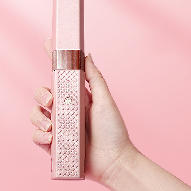 Draagbare krultang met draadloos opladen via USB