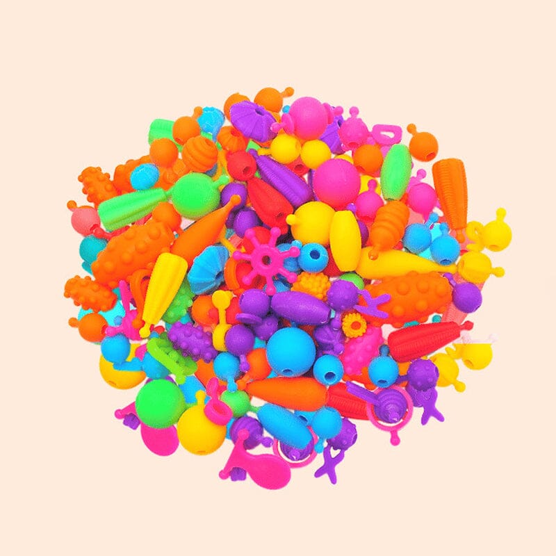 Kindersieraden maken van klikkralen