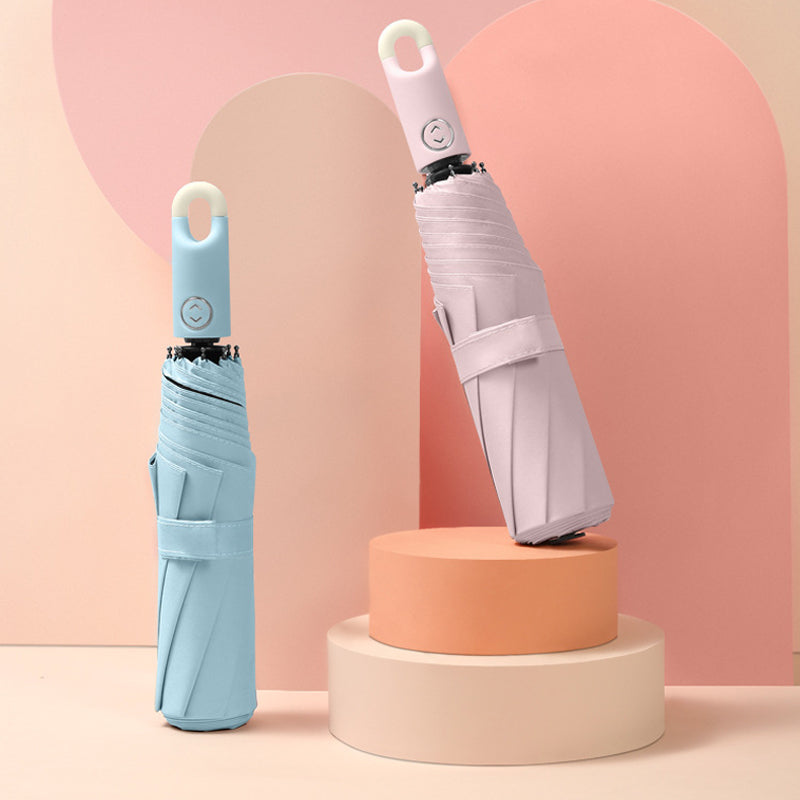 Drievoudige, zelfopenende en intrekbare paraplu met gesp