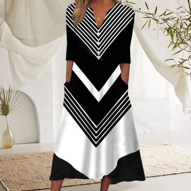 Zwart-witte midi-jurk met matrozen streep en zijzakken