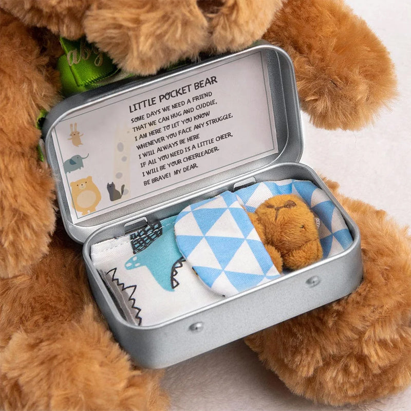 Teddybeer in een blikken doos