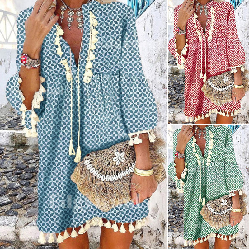 Producten Jurk met V-hals en franjes met ruches