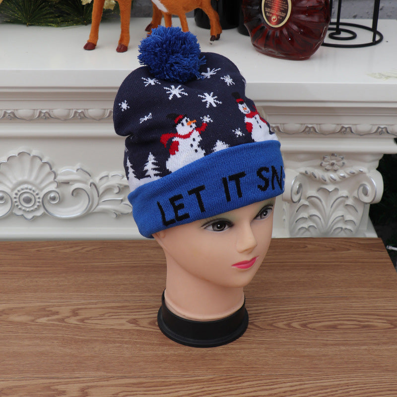 Kleurrijke lichtgevende gebreide kerstmuts