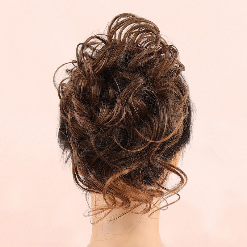 Rommelige knot haarstukjes