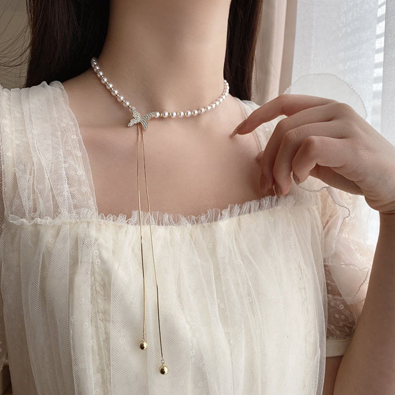 Verstelbare ketting met vlinderparel