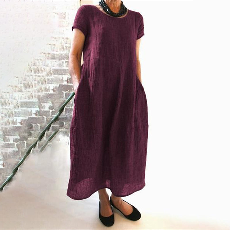 Losse katoenen jurk met ronde hals in effen kleur