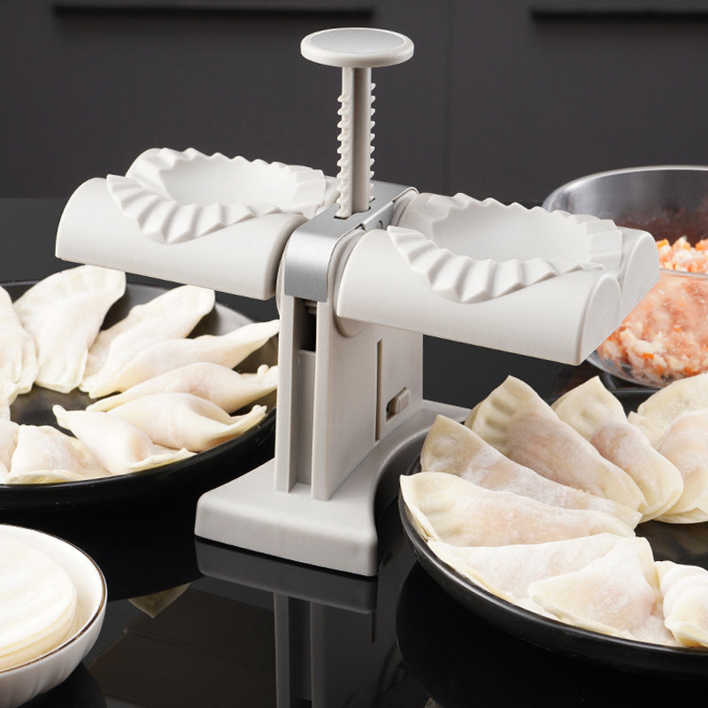 Huishoudelijke dubbelkoppige knoedel maker