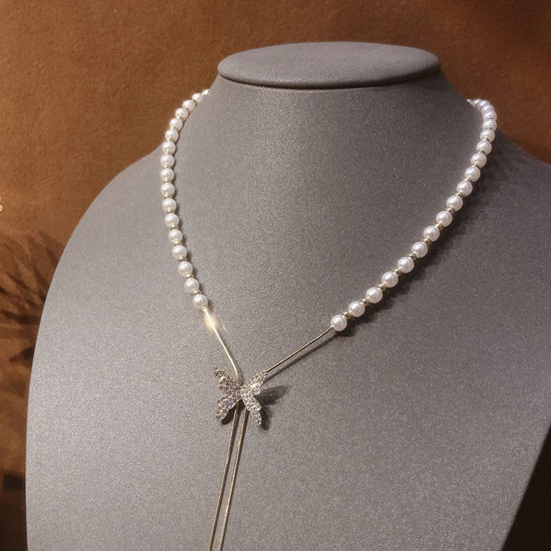 Verstelbare ketting met vlinderparel