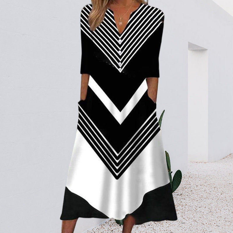 Zwart-witte midi-jurk met matrozen streep en zijzakken