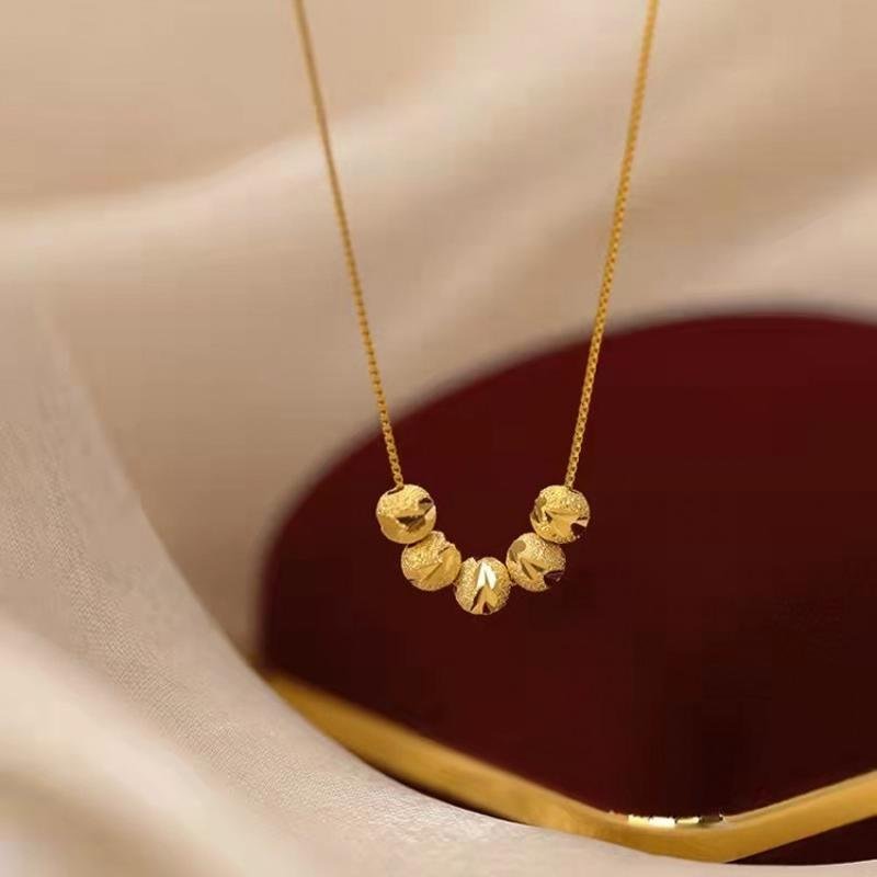 Overdracht kralen ketting en armband