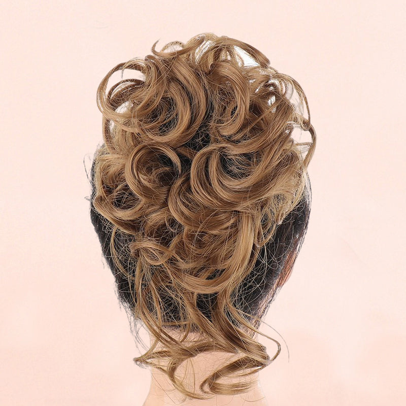 Rommelige knot haarstukjes