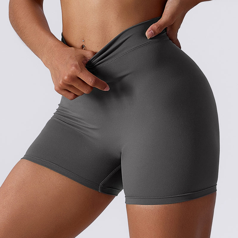 Beeldhouwende shorts met ruches en V-rug