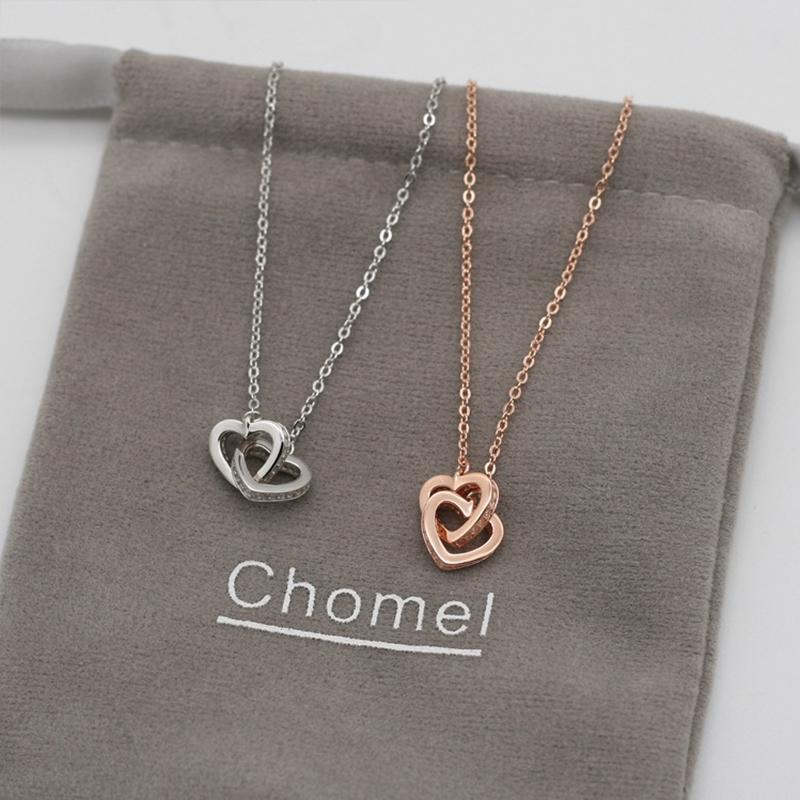 Inelkaar grijpende harten ketting