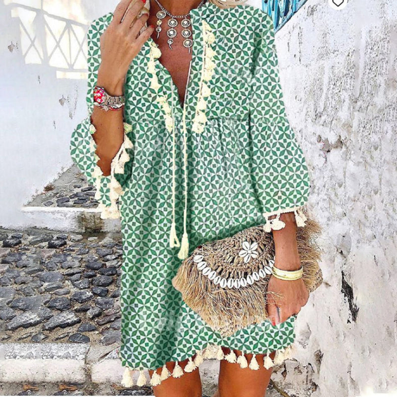 Producten Jurk met V-hals en franjes met ruches