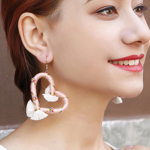 Hart met de hand geweven oorbellen