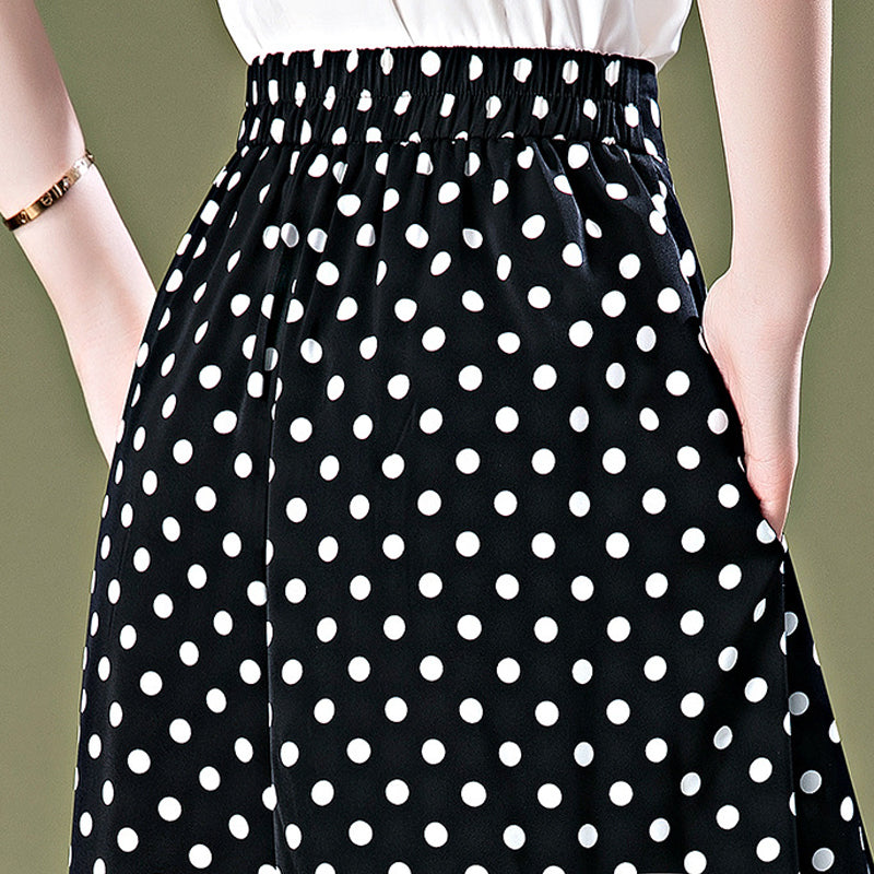 Zwarte culotte van chiffon met stippen