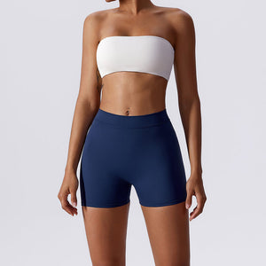 Beeldhouwende shorts met ruches en V-rug