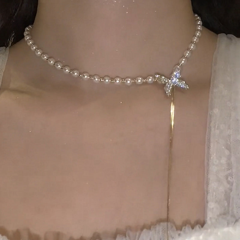 Verstelbare ketting met vlinderparel