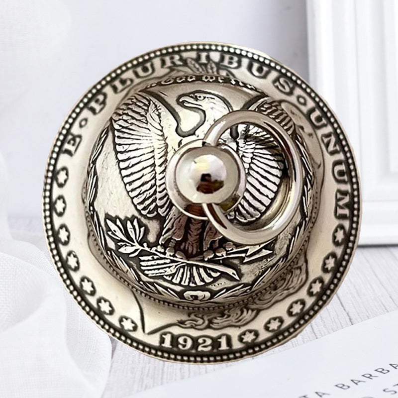 Morgan zilveren dollar bel