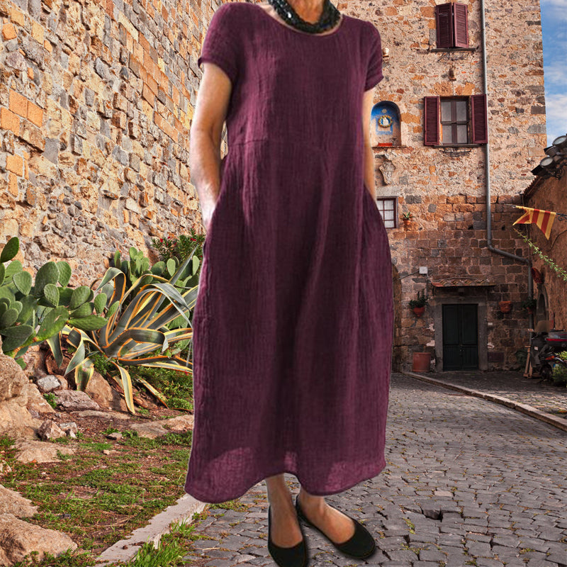 Losse katoenen jurk met ronde hals in effen kleur