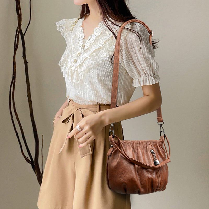 Schoudertas voor dames met retro textuur