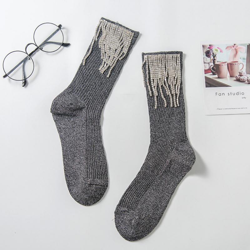 Damessokken met kwastjes