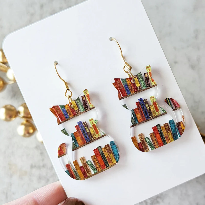 Kat Oorbellen Met Boeken