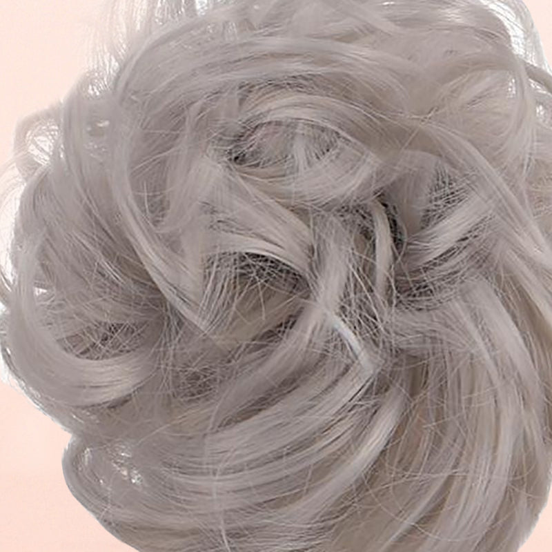 Rommelige knot haarstukjes