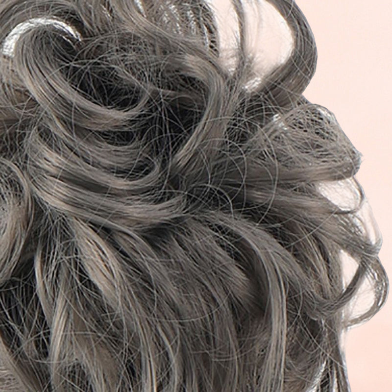 Rommelige knot haarstukjes