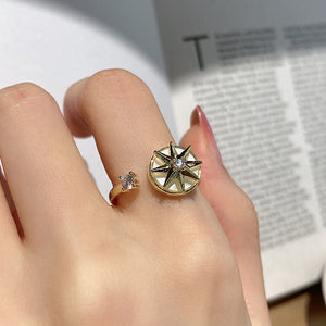 Achtpuntige ster wervelende ring