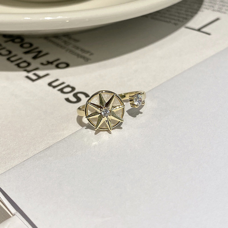 Achtpuntige ster wervelende ring