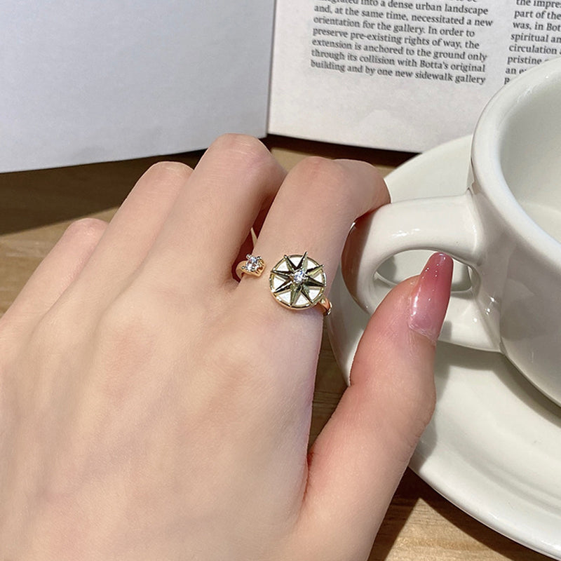 Achtpuntige ster wervelende ring