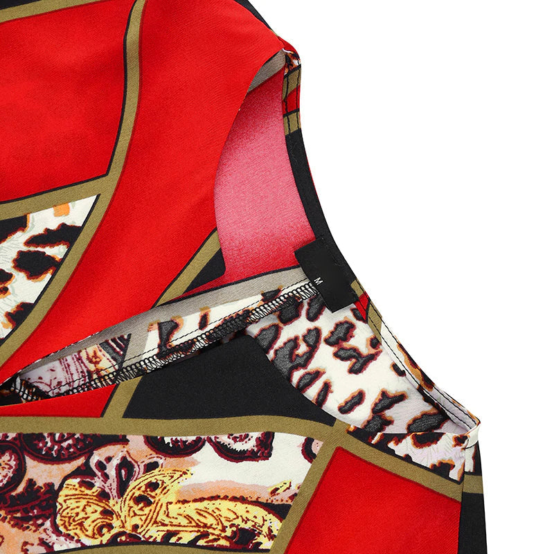 Grote maat bedrukte v-hals losse jurk met lange mouwen