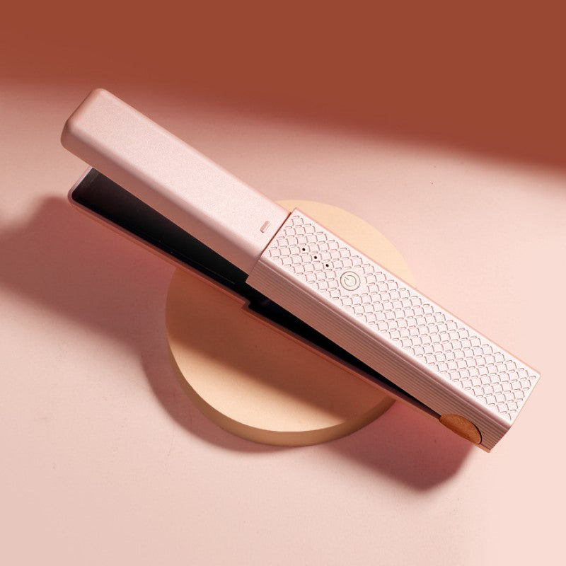 Draagbare krultang met draadloos opladen via USB