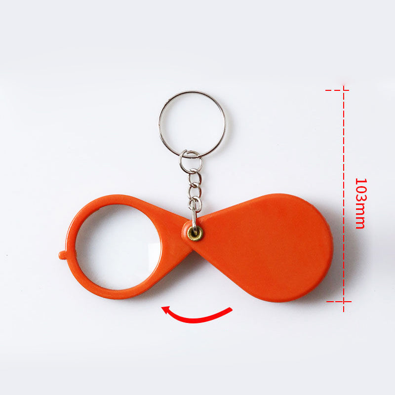 Opvouwbare sleutelhanger met vergrootglas