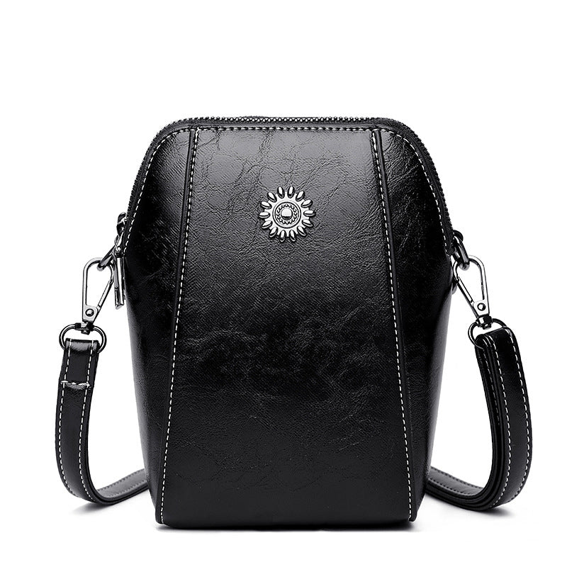 Mini-crossbodytas van zacht leer