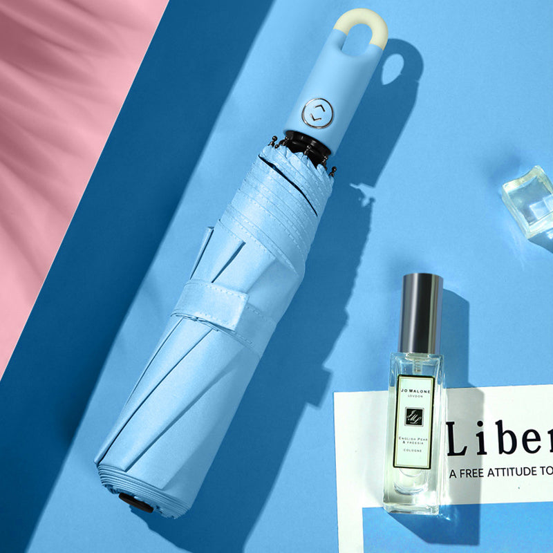 Drievoudige, zelfopenende en intrekbare paraplu met gesp