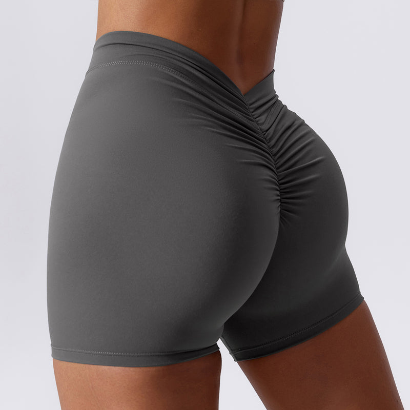 Beeldhouwende shorts met ruches en V-rug